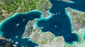 Island Hopping Prints: Aerial view of beautiful lagoons and limestone cliffs of Coron, Palawan, Philippines