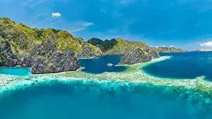 Island Hopping Prints: Aerial view of beautiful lagoons and limestone cliffs of Coron, Palawan, Philippines