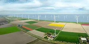 Wind Turbine Prints: aerial view of a beautiful landscape filled with colorful tulips and wind turbines