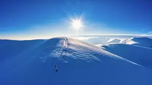 Aerial view of beautiful winter mountain slopes