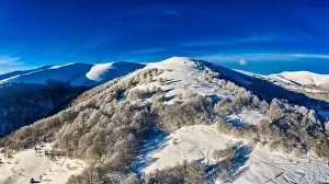Valley Hills Prints: Aerial view of beautiful winter mountain slopes