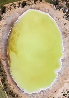 Perth Prints: Aerial view of the beautiful yellow salt lake known as Statues lake located next to highway 40 in the wheatbelt region