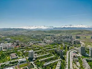 Kyrgyzstan Prints: Aerial view of Bishkek city Kyrgyzstan with snow-capped mountains
