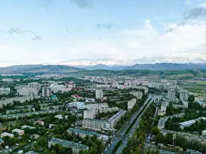Aerial view of Bishkek city Kyrgyzstan with snowy mountains in the background