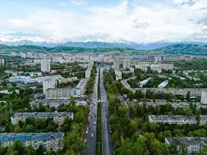 Bishkek Prints: Aerial view of Bishkek city Kyrgyzstan with snowy mountains in the background