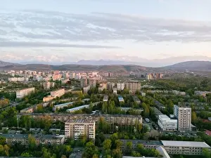 Kyrgyzstan Prints: Aerial view of Bishkek city Kyrgyzstan with snowy mountains in the background