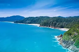 Buzz Prints: Aerial view of blue ocean and tropical beach over sky background