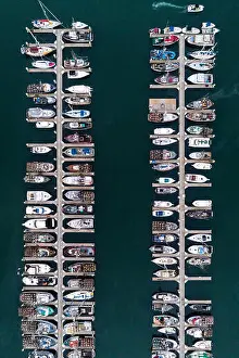 Slips Prints: An aerial view of boats docked in Spud Point Marina