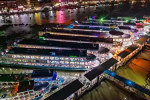 Bird Eye View Prints: Aerial view of boats nestled along a pier