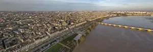 Gironde Prints: Aerial view of Bordeaux, Saint Michel Church and Garonne river, filmed by drone, France