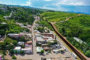 Eeuu Prints: Aerial view of the border wall in Nogales Sonora (L) in Mexico and Nogales Arizona (R) in the United States