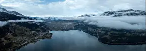 Trentino Prints: Aerial view of Caldonazzo Lake with snow capped Alps, Trentino, Italy