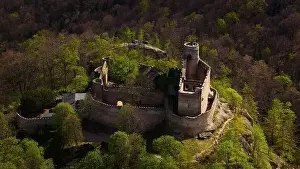 Karkonosze Prints: An aerial view captures the medieval Chojnik Castle atop a mountain in the Karkonosze range