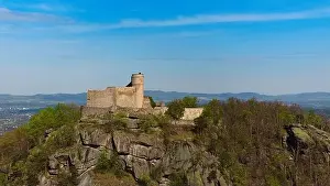 Karkonosze Prints: An aerial view captures the medieval Chojnik Castle atop a mountain in the Karkonosze range