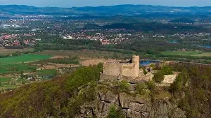Karkonosze Prints: An aerial view captures the medieval Chojnik Castle atop a mountain in the Karkonosze range