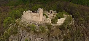 Karkonosze Prints: An aerial view captures the medieval Chojnik Castle atop a mountain in the Karkonosze range