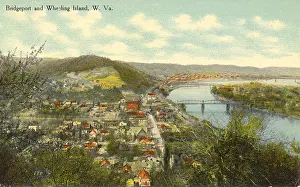 Riverfront Prints: This aerial view captures the scenic landscape of Bridgeport and Wheeling Island in West Virginia