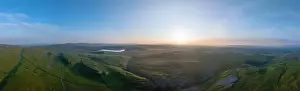 Wide Shot Prints: Aerial view capturing the sun setting over the hilly terrain near Cowside Beck, Arncliffe