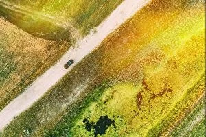 Aerial Landscape Collection: Aerial View Of Car SUV Parked Near Countryside Road, Summer Field Rural Landscape near bog marsh