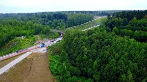 Norge Prints: Aerial view of cars travelling in beautiful forested terrain