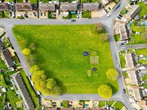 Aerial Cityscape Prints: Aerial top down view of a centre green space area and small playground
