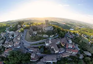 Vinery Prints: Aerial view of Cigognola Castle - vineyards and countryside in background