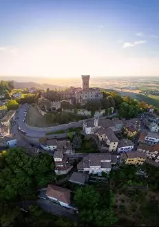 Vinery Prints: Aerial view of Cigognola Castle - vineyards and countryside in background