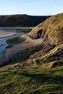 Swansea Prints: Aerial view of Three Cliffs Bay south coast beach the Gower Peninsula Swansea Wales uk