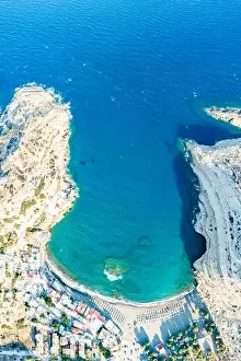 Exoticism Prints: Aerial view of cliffs and beach washed by the turquoise colored sea, Matala, Crete, Greece