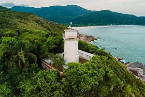 Florianopolis Prints: Aerial view of coastline with lighthouse and ocean on Santa Catarina island, Brazil