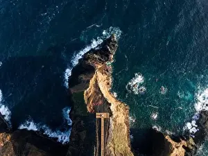 Waters Edge Prints: Aerial view of the coasts and cliffs of the island of Sao Miguel over the lighthouse of Farolim dos Fenais da Ajuda