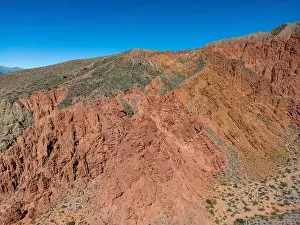 Serrated Prints: Aerial view of the colorful hiking area Quebrada de las Señoritas in Jujuy