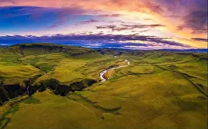 Fjadrargljufur Prints: Aerial view of a colorful sunset above Fjadrargljufur canyon in Iceland