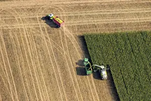 North Rhine Westphalia Prints: Aerial view, corn harvest with Claas Mower Tractor