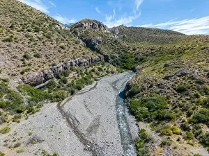 Aerial view of a creek running through the gorge of Quebrada El Diablo in Chile - Traveling on the Carretera Austral