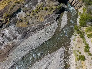 Carretera Austral Prints: Aerial view of a creek running through the gorge of Quebrada El Diablo in Chile - Traveling on the Carretera Austral