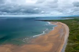 Emerald Isle Prints: An aerial view of Doughmore Bay and Beach in County Clare in western Ireland