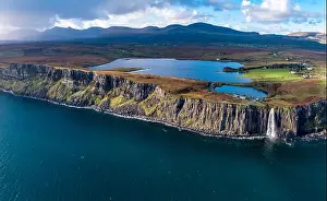 Aerial view of the dramatic coastline at the cliffs by Staffin with the famous Kilt Rock waterfall - Isle of Skye