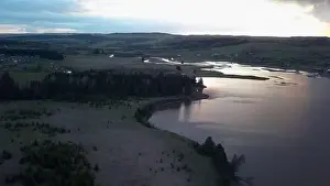 Bending Prints: Aerial view of dramatic sunrise sky and landscape with curved river