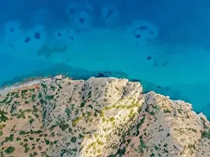 Blue Beach Prints: Aerial top view by drone of cretan landscape with sea