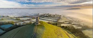 Typically Prints: Aerial view by drone of frosty winter morning at Glastonbury Tor