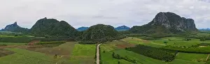 Aerial view Drone Panorama. Mountain and corn field in Rainy season. Agriculture and beautiful nature