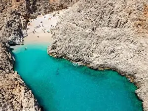 Aerial top view by drone of Seitan limania or Agiou Stefanou beach with turquoise water in Chania