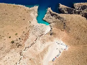 Water Tourism Prints: Aerial top view by drone of Seitan limania beach with turquoise water on Crete, Greece