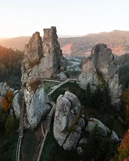 Aerial view from drone to Tustan fortress - archeological and natural monument of national significance in Urych village in autumn time, Ukraine