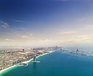 Scraper Prints: Aerial view of Dubai shore downtown with palm island on background