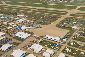 Sky Travel Prints: An aerial view of EAA Airventure grounds with planes and tents