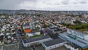 Industrial Area Prints: Aerial view of a European city with a mix of residential and commercial buildings
