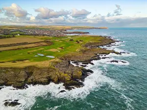 Seafront Prints: Aerial view of Eyemouth golf course beside rocky coastline in Berwickshire
