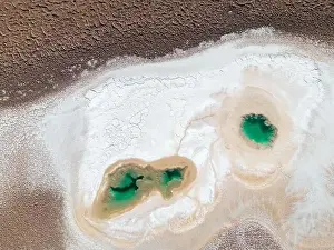 Alkaline Prints: Aerial view of the famous tourist attraction Ojos del Mar near Tolar Grande in the Argentinian highlands called Puna